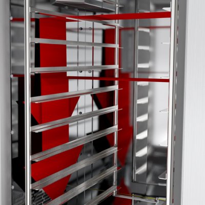 Bakery rack oven with rotating rack and optimal air flow for baking on trays